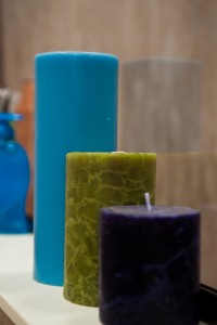 Blue_Green_Purple_Candles_on_White_Shelf_beige_Background_IMG_0532_LR_bci