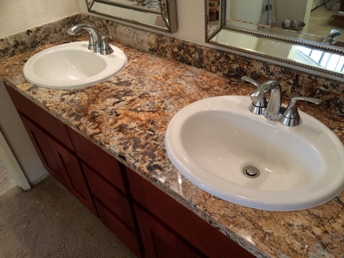 New vanity with Granite slab and double bowls